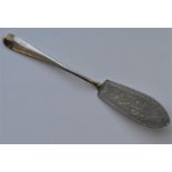 An Edwardian silver butter knife with bright cut d