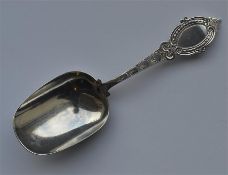 An unusual bright cut caddy scoop with engraved de