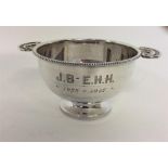 A good silver two-handled bowl on circular pedesta