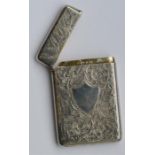 An attractively engraved card case with hinged top