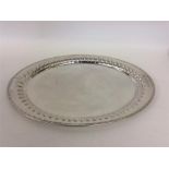 A large oval plated gallery tray. Est. £60 - £80.
