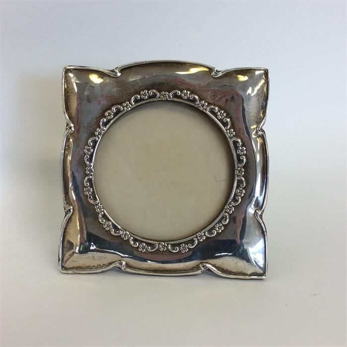 A square picture frame with circular aperture to l - Image 2 of 2