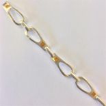 A stylish silver and yellow enamelled bracelet wit