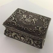 A rectangular dressing table box with hinged top a