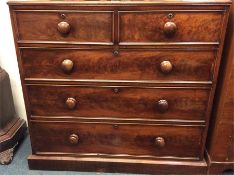 A mahogany chest of five drawers on plinth base. E