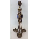 A stylish Arts & Crafts lamp base inset with gem s