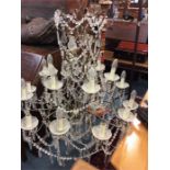 A large 20th Century glass chandelier. Est. £60 -