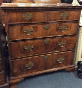 A William and Mary style chest of five drawers on