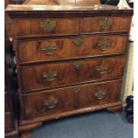 A William and Mary style chest of five drawers on