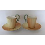 ROYAL WORCESTER: A pair of cabinet cups and saucer