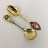 A silver gilt and enamelled spoon by Georg Jensen