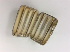 A good four finger cigar case with hinged side and