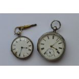 A silver open faced pocket watch together with a f