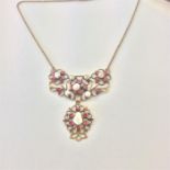 An Antique garnet and pearl pierced necklace with