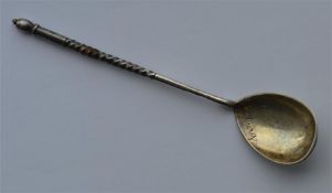 A Russian ice cream spoon with twisted terminal an
