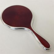 An attractive red enamelled mirror with white bord