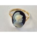 A small oval hard stone cameo ring of a warrior in