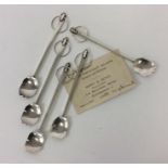 A stylish set of five silver fruit spoons with ham