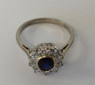 A good 18 carat white gold sapphire and diamond cl