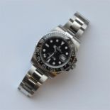 ROLEX: A gent's GMT Master II in mint condition wit