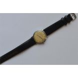 A gent's Girard-Perrejaux wristwatch on black leat