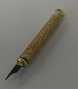 A heavy gold mounted extending pencil by S Mordan