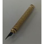 A heavy gold mounted extending pencil by S Mordan