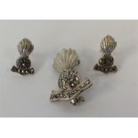 A silver and marcasite Military brooch together wi