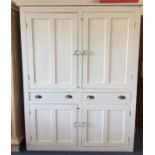 A large painted pine four door kitchen cupboard wi