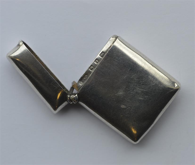 A silver hinged top plain vesta case. Birmingham.