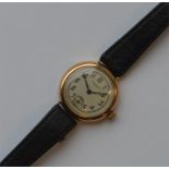 A lady's circular Waltham wristwatch with silvered