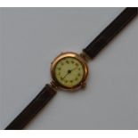 A lady's 9 carat Rolex wristwatch on leather strap
