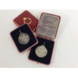 A pair of boxed silver Shire Horse Society medalli