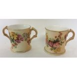 ROYAL WORCESTER: A two handled loving cup decorate