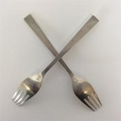 GEORG JENSEN: A pair of stylish forks. Approx. 17