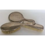 Three pieces of silver mounted dressing table item