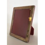 A large modern 925 standard picture frame with red