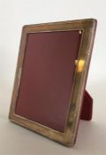 A large modern 925 standard picture frame with red