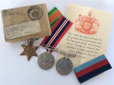 A group of three Coronation medals contained withi