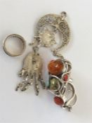 A collection of silver rings, pendants etc. Approx