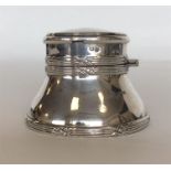 An unusual capstan inkwell with hinged top and poc