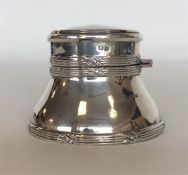 An unusual capstan inkwell with hinged top and poc