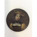 An oval painting of a lady with hat. Approx. 9 cms