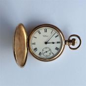 A gent's gilt Waltham pocket watch with white enam