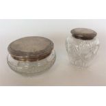 Two silver Continental dressing table jars. Est. £