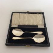 A pair of boxed plain preserve spoons. Sheffield.