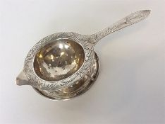 TACKHINE: A Chinese tea strainer on stand of typic