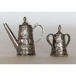 An unusual Eastern miniature coffee pot together w