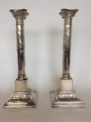 A tall pair of Georgian style Corinthian column ca