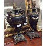 A pair of large heavy brass mounted lamps.
